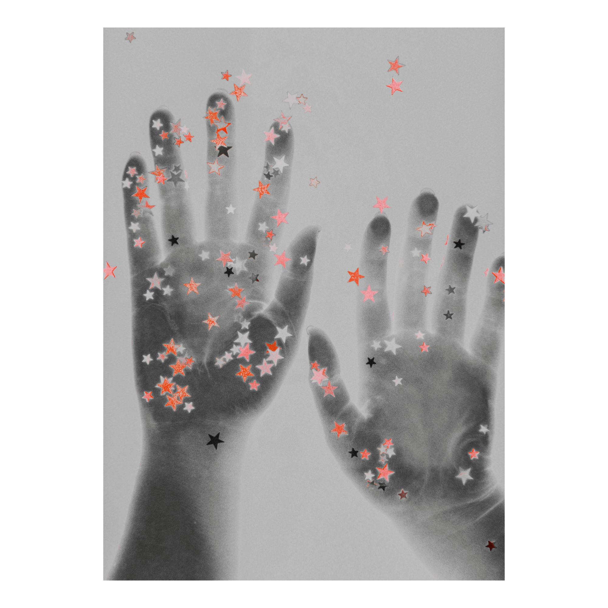 Handprints with decorative star confetti on a gray and orange background