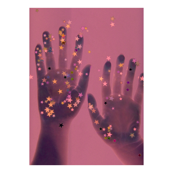 Handprints with star-shaped confetti on a reddish-pink background