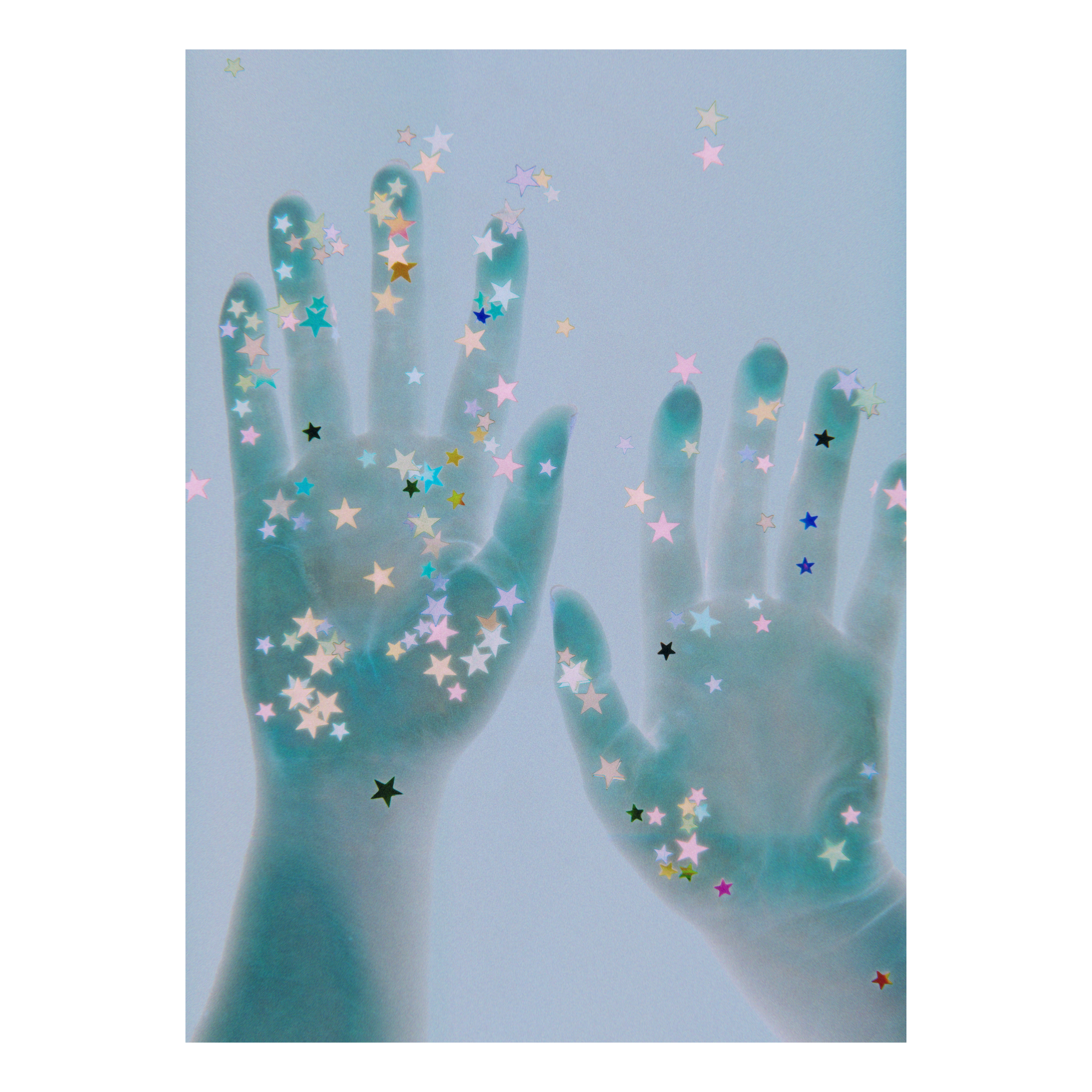 Handprints with colorful star-shaped confetti on a light blue background